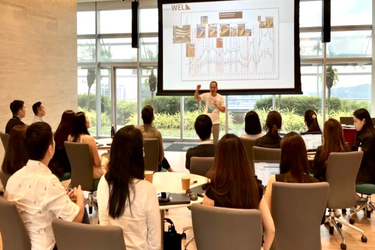 Corporate wellbeing workshop at JTC Singapore with professional audience in bright conference room